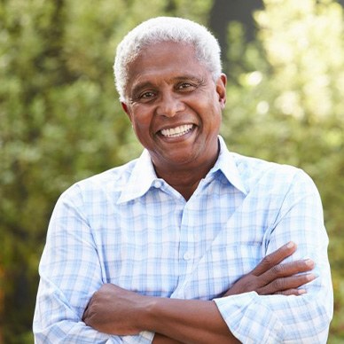 Man smiling outdoors