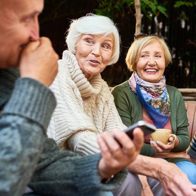 Friends enjoying brunch in the backyard