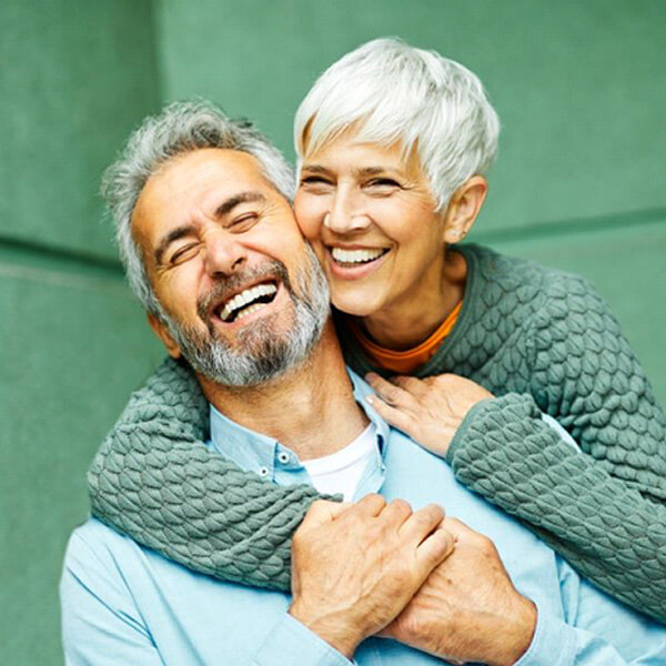 portrait of happy, laughing senior couple