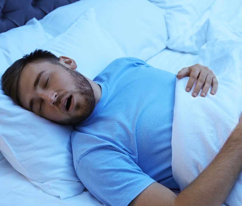 Man snoring before sleep apnea treatment in Hingham, MA