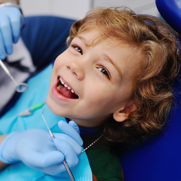 Child smiling after receiving dental sealants