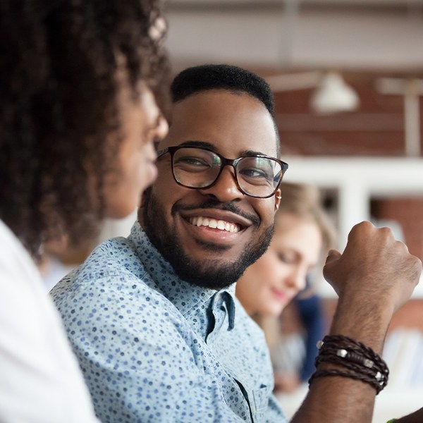 Man sharing flawless smile thanks to dental bonding