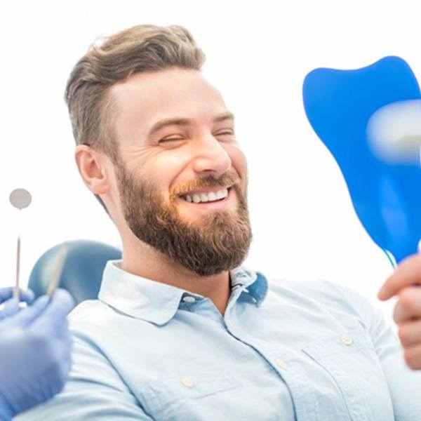 a patient visiting their Blue Cross Blue Shield dentist