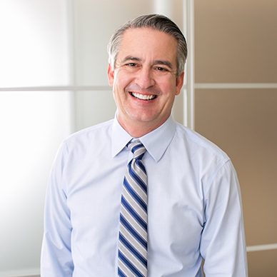 senior businessman smiling in his office 