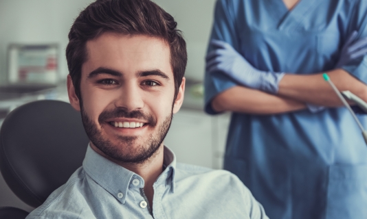 Man smiling during dental treatment