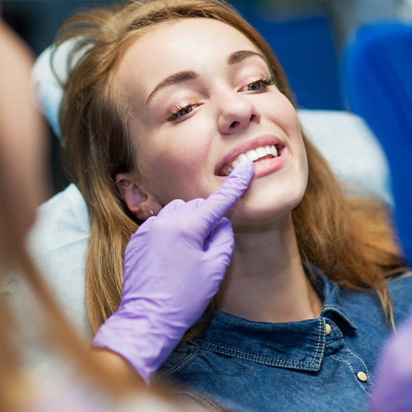 Dentistry patient receiving dental checkup and teeth cleaning