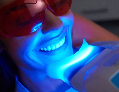 person getting in-office teeth whitening from their cosmetic dentist in Hingham